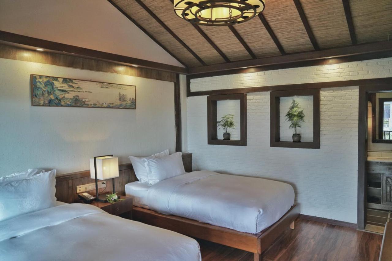 Ne-Tsang Inn Lijiang Лицзян Экстерьер фото